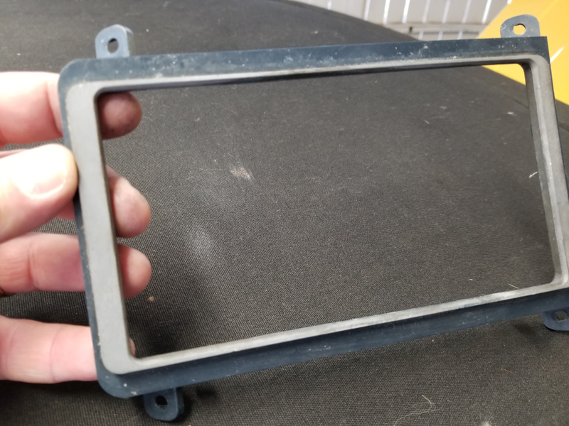 I am trying to restore this plastic trim that goes around the shift boot. I guess paint is probably the only way it will be black again.